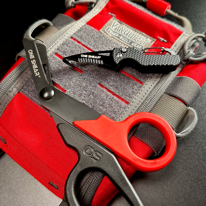 Black Seat Belt Evacuation Tool with carabiner and serrated edge spring action